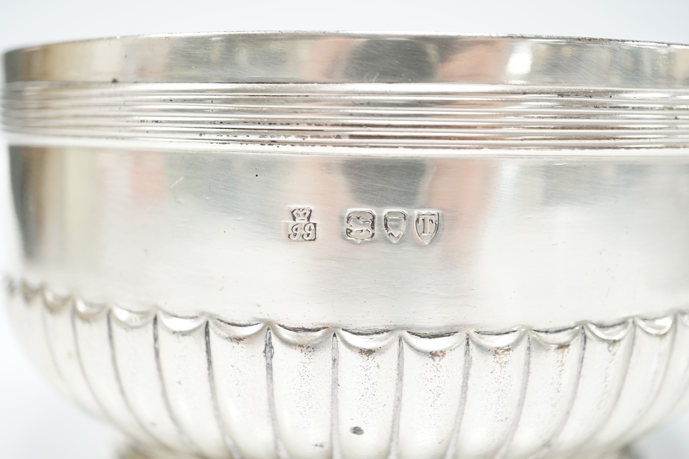 A late Victorian demi fluted silver circular bowl by R & S Garrard & Co, London, 1894, 14.1cn diameter, 14.6oz.